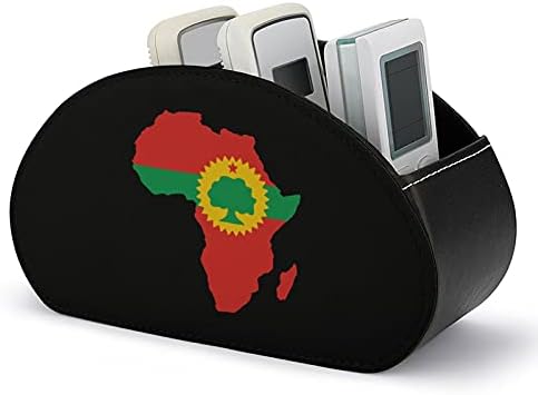 דגל אורומו על מפת אפריקה מחזיק בשלט רחוק מארגן שולחן עבודה של אדירה לאחסון עבור ציוד משרדי טלוויזיה